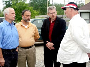 During a visit to Timmins in June 2008, NDP leader Jack Layton, left, MPP Gilles Bisson and MP Charlie Angus listen while Good Samaritan Inn executive director Ed Ligocki talks about some of the challenges in running the homeless shelter without financial support from any level of government. Ligocki died last week at the age of 68.

The Daily Press file photo