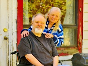 Long-serving crossing guard Joey Davis, of Waterford, is eager to get busy again following surgery on his leg arising from complications related to diabetes. With Davis is his sister Sharron. A GoFundMe page has been established in Davis's name to help with the purchase of a prosthetic limb and necessary modifications to his home on Nichol Street. Monte Sonnenberg/Postmedia Network