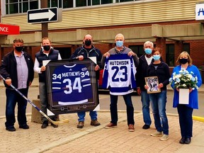 Some former NHL players lent moral support to Mike VanNetten, of Simcoe, and his family during a visit to the Health Sciences Centre in Hamilton. From left are Mike's brother Kevin VanNetten, retired hockey pro Ryan Vandenbussche, of Vittoria, retired hockey pro Dave Hutchison, Norfolk farmer Todd Boughner, Mike's father Jack VanNetten, Mike's spouse Sarah VanNetten, and sister-in-law Cindy VanNetten. Handout