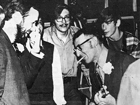 BACK-STAGE LAUGH-  Benny Tedesco (right), who played a guitar in the high school production of Irma LaDouce, shares some back-stage horseplay with teacher Ken Laird, musical director for the play, and a group of students. Students and teachers spent the past four months preparing for the two performances which were a decided success. .TP.jpg