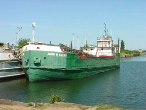 The John R Emery at Erie, Pennsylvania, August 2001. In 1957/1958, the Emery's steam engine was replaced with two diesel engines and the forward wheelhouse removed. Although these modifications substantially changed the Emery's profile, the bow of the Emery in this photo, is the same bow, painted green (just as in Alan Mann's memories), that battled the Central Bridge during the Sydenham River Crisis of November 1944. Photo by Jeff Thoreson as posted at Shipspotting.com