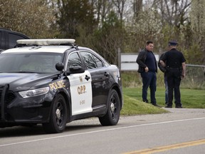 Oxford OPP officers were at The Bridges in Tillsonburg golf course Friday, taking notes and snapping photos of golfers. The golf course was charged Thursday night under the Reopening Ontario Act for violating the province's lockdown orders.
KATHLEEN SAYLORS/SENTINEL-REVIEW