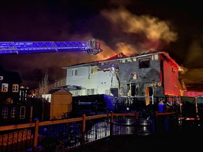 Local firefighters responded to a duplex fire on Charlotte Crescent during the early morning hours on Sunday, May 2. Local police called the fire "suspicious" on Monday, May 3, and said it is likely connected to an arsonist who hit the same neighbourhood earlier in the week.  Photo courtesy SCES