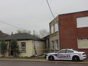 London police remained Monday morning at the scene of a Sunday fire that damaged a Hamilton Road home, doing $300,000 in damages. JONATHAN JUHA/The London Free Press