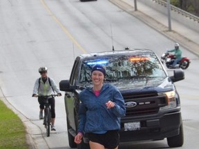 Olivia Duwyn runs along 10th Street East on Saturday, May 1, 2021. Duwyn was running a marathon as part of her fundraiser for child and youth mental health supports at the Owen Sound hospital.