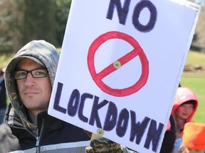 An anti-lockdown protester attends a rally at Bellevue Park in Sault Ste. Marie’s east end last Friday. Brian Kelly/Postmedia Network