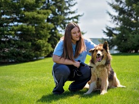 Brooke Bell, an animal care canine attendant with the Humane Society of Kitchener Waterloo and Stratford Perth, enjoys some time outside with one of the shelter’s dogs. After hitting a $100,000 fundraising target, the humane society will be able to add a new dog park behind it’s Stratford location on Griffith Road. (Contributed photo)