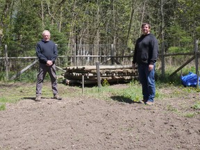 Al Robson, left, site manager of the Tillsonburg Community Gardens, thanked local farmer Mike Peever, Canadian Imperial Ginseng, for the donation of fence posts which will be used this summer to reconstruct the gardens' perimeter fence. (Chris Abbott/Norfolk & Tillsonburg News)