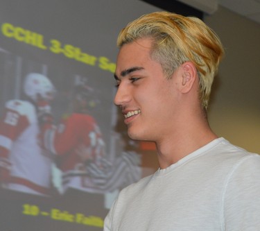 Eric Faith, still sporting the late-season hair colour, accepts an award at the Brockville Jr. A Braves year-end dinner in April 2019. Faith was the team's regular season MVP.
File photo/The Recorder and Times