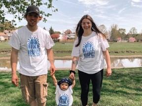 Megan, Bronson and Greyson Parry walk along Mud Creek Trail, as part of the 2021 Hike for Hospice Chatham-Kent. (Handout)