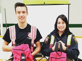 Chatham-Kent Fire & Emergency Services public educator Whitney Burk, right, is seen here in a 2017 photo with former CKFES co-op student Ryan Morrison holding 72 hour emergency kits.