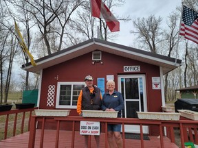 Wolf and Darlene Wilms outside of their office at the George Lane Campground on May 3.
