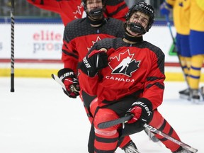 Canada's Chase Stillman (6) celebrates after scoring a second-period goal against Sweden during semifinal-round action at the 2021 IIHF Men's Under-18 World Championship at Comerica Center in Frisco, Texas on May 5, 2021.