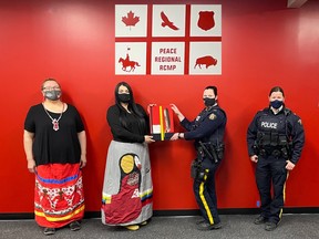 From left to right, Wendy Goulet, Naomi Chalifoux-Sawan, Corporal Courtney Tipton, Corporal Michelle Phillips.