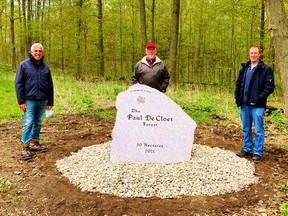 Paul DeCloet of Clear Creek, centre, recently donated a 125-acre stand of Carolinian woodlot to Norfolk County. On hand for the happy occasion were, at left, Port Rowan-area Coun. Tom Masschaele and Norfolk forest supervisor Adam Biddle, at right. – Contributed photo