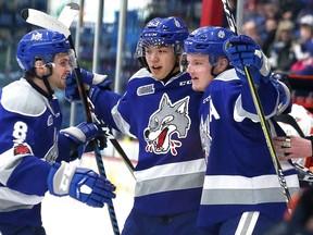 Players from the Sudbury Wolves celebrate a gaol during OHL action against the Flint Firebirds at the Sudbury Community Arena in Sudbury, Ont. on Friday February 9, 2018.