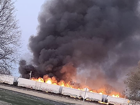 Flames were higher than train cars this morning after a fire broke out on the tracks in Portage la Prairie. (supplied photo)