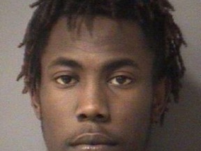 Kwami Garwood, 21, is accused of the first-degree murder of Andre Charles and the kidnapping of Salina Ouk.