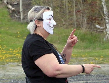 Protesters opposed to COVID-19 restrictions participated in an anti-lockdown rally in the parking lot across from Bell Park in Sudbury, Ontario on Saturday, May 15, 2021. Greater Sudbury Police officers were also present at the event. Ben Leeson/The Sudbury Star/Postmedia Network