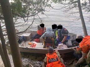 Manitoulin OPP located 49-year-old Rebecca Campbell (centre, seated and facing away from camera), who had been reported missing on Friday morning, at around 7:45 p.m., police said in a release issued later that night. Campbell was found in good health.
