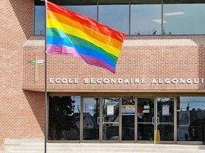 The Pride flag is seen outside École secondaire catholique Algonquin, Monday, to recognize the International Day Against Homophobia, Transphobia and Biphobia. Supplied Photo