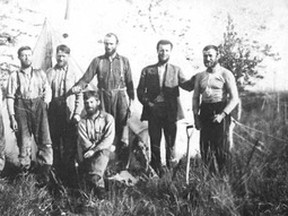 •	178.02.02 (178.141) – From Alberta on Record – South Peace Regional Archives – Jim Somerville fonds: Some of Walter McFarlane's survey crew, 1909. “Razors were left in civilization”. Back row l-r: Davis, unknown, Doc Montgomery, Leo –, Ring Reid, and Jarvis; (Front Row): Bill Wiliamson. 
Jim Somerville from whose fonds this photograph was taken was a packer    on McFarlane’s crew.