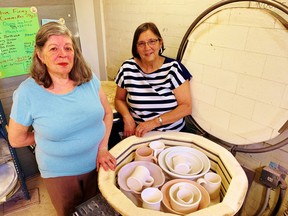 Sandy Doomernik, left, and Linda Ball of the Norfolk Potters Guild and Studio in Simcoe would welcome support from the community as the group makes the difficult transition from their long-time home on Pond Street in Simcoe across town to a new space at the Norfolk County Fairgrounds. – Monte Sonnenberg