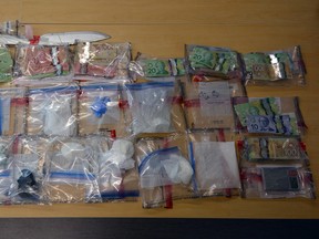 Project Renewal officers seized drugs, cash and more in searches Tuesday in Belleville. Project Renewal photo