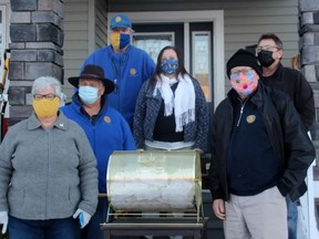 Members of the Fort Saskatchewan Rotary Club, pictured at their 50/50 fundraiser. The local Club announced their latest fundraiser, an online auction, this week. Photo Supplied.