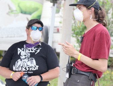 Location property manager Melissa Villeneuve and location production assistant Greg Johnson on the set of A Christmas Letter in Sault Ste. Marie, Ont., on Thursday, May 20, 2021. (BRIAN KELLY/THE SAULT STAR/POSTMEDIA NETWORK)