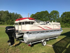 This 2007 Apex Qwest pontoon boat, motor and trailer were stolen from a business in Desbarats. SUPPLIED
