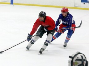 Alex Pharand, left, and Mitchell Martin take part in a practice at Garson Arena on Wednesday, October 14, 2020.