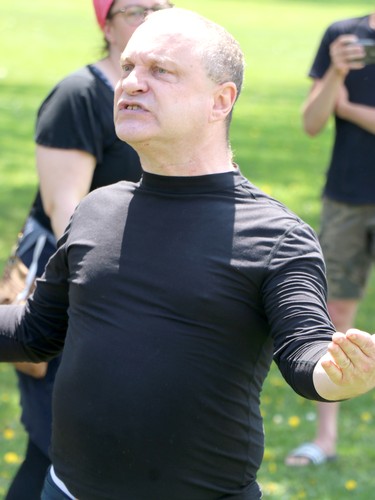 A demonstrator speaks to police during an anti-lockdown rally at Bellevue Park in Sault Ste. Marie, Ont., on Saturday, May 22, 2021. (BRIAN KELLY/THE SAULT STAR/POSTMEDIA NETWORK)