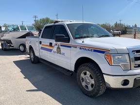 An RCMP Truck towing the RCMP boat. (supplied photo)