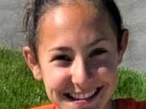 Hudson Mulvihill, 14, scribbled in chalk a message on her Belleville neighbourhood streets that the remains of the 215 Indigenous children found at a former residential school in Kamloops won't be forgotten. SUMMER BERTRAND
