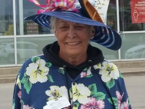 Roseann Pickett never misses a chance to create a new hat for holiday   celebrations - May 2/4 in this case. Pickett dressed for party success, including a hat festooned with a canoe, beer can and beanie and ribbons while working at Your Independent Grocer in Port Elgin on the long weekend. [Frances Learment]