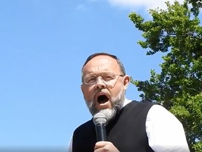 Henry Hildebrandt, the pastor of Aylmer's Church of God, was one of the speakers Sunday at an anti-lockdown rally in Woodstock's Museum Square.
Facebook Screenshot