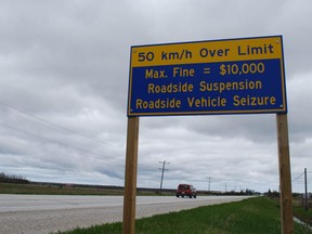 A vehicle, heading north on Highway 6 just south of Ferndale, passes by a Ministry of Transportation sign warning motorists about the consequences of stunt driving. DENIS LANGLOIS