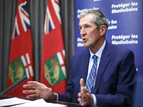 Premier Brian Pallister announces that his government is launching a new Manitoba Pandemic Sick Leave program that will provide direct financial assistance to help fill gaps between federal programming and current provincial employment standards for paid sick leave, during a press conference at the Manitoba Legislative building Friday morning. MIKE DEAL/POOL/WINNIPEG FREE PRESS