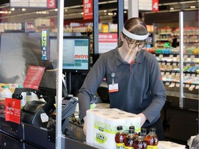 Metro grocery clerk Gillian Wiggins was busy even on a Monday afternoon April 20, 2020.