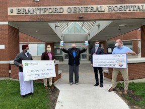 A donation santizer and wipes worth about $400,00O has been made to the Brant Community Healthcare System Foundation: In the photo are Abu Norman Tarek, imam of the Brantford Muslim Association, Shaukat Hussain of the ICNA Relief Canada, Mario Colombo; BCHS foundation chair,  David McNeil,  BCHS president, and Fusion Products owner Randy Nobes.