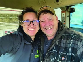 Courtney and her father-in-law Bob running wagons during corn harvest last year
