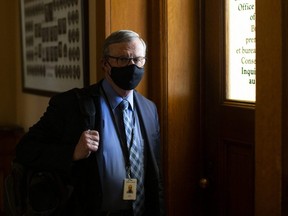 Ontario's Chief Medical Officer Dr. David Williams outside Premier Doug Ford's office at the Queens Park Legislature in Toronto on Wednesday, April 7, 2021.