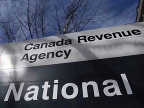 The Canada Revenue Agency sign outside the National Headquarters at the Connaught Building in Ottawa is seen on March 1, 2021.