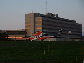An Ornge air ambulance sits outside the Owen Sound hospital April 30. Inside, staff are stretched and stressed after dealing with the pandemic for well over a year and now seeing the sickest patients and younger patients.