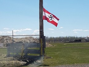 Hitler Youth flag on a property near Breton, Ab. about 110 kilometres southwest of Edmonton on May 11, 2021. The Friends of Simon Wiesenthal Center for Holocaust Studies says it was alerted Sunday to a Nazi and a Confederate flag on a property near Breton, Alberta. Postmedia Network.