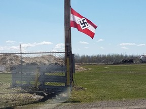 Hitler Youth flag on a property near Breton, Ab. about 110 kilometres southwest of Edmonton on May 11, 2021. The Friends of Simon Wiesenthal Center for Holocaust Studies says it was alerted Sunday to a Nazi and a Confederate flag on a property near Breton, Alberta.