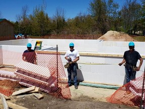 A Habitat for Humanity build site at Saugeen First Nation Friday. From left to right is Barton Kewageshig, Jeremy Mitchell and Tyler Nawash; all from Saugeen First Nation. (Supplied photo)