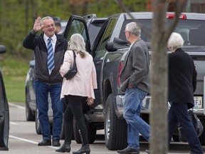MPP for Lanark–Frontenac–Kingston Randy Hillier greets fellow churchgoers prior to entering the Church of God for Sunday service in Aylmer on May 9, 2021.
