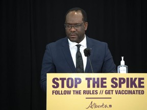 Minister of Justice and Solicitor General Kaycee Madu joins other provincial minister as they speak from Edmonton and Calgary on Wednesday, May 5, 2021. Madu apologized Tuesday for accusing the NDP, media and federal government of wanting a COVID-19 disaster, one day after those comments sparked outrage and his office said he wouldn't say sorry.